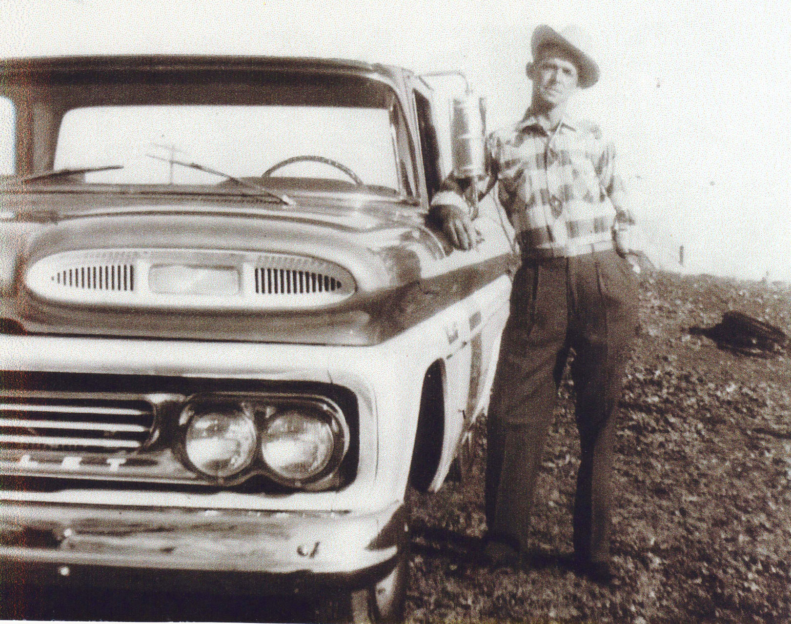 Everett Decker and truck.jpg